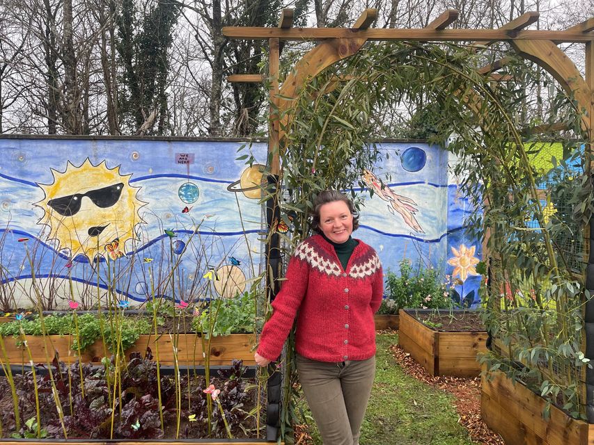 Safe Ireland Mayo volunteer and gardener Dominika Adamiec with the garden she created at the refuge centre.